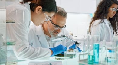 research-laboratory-interior-with-medical-samples-multi-ethnic-team-picture-id1275317484-1